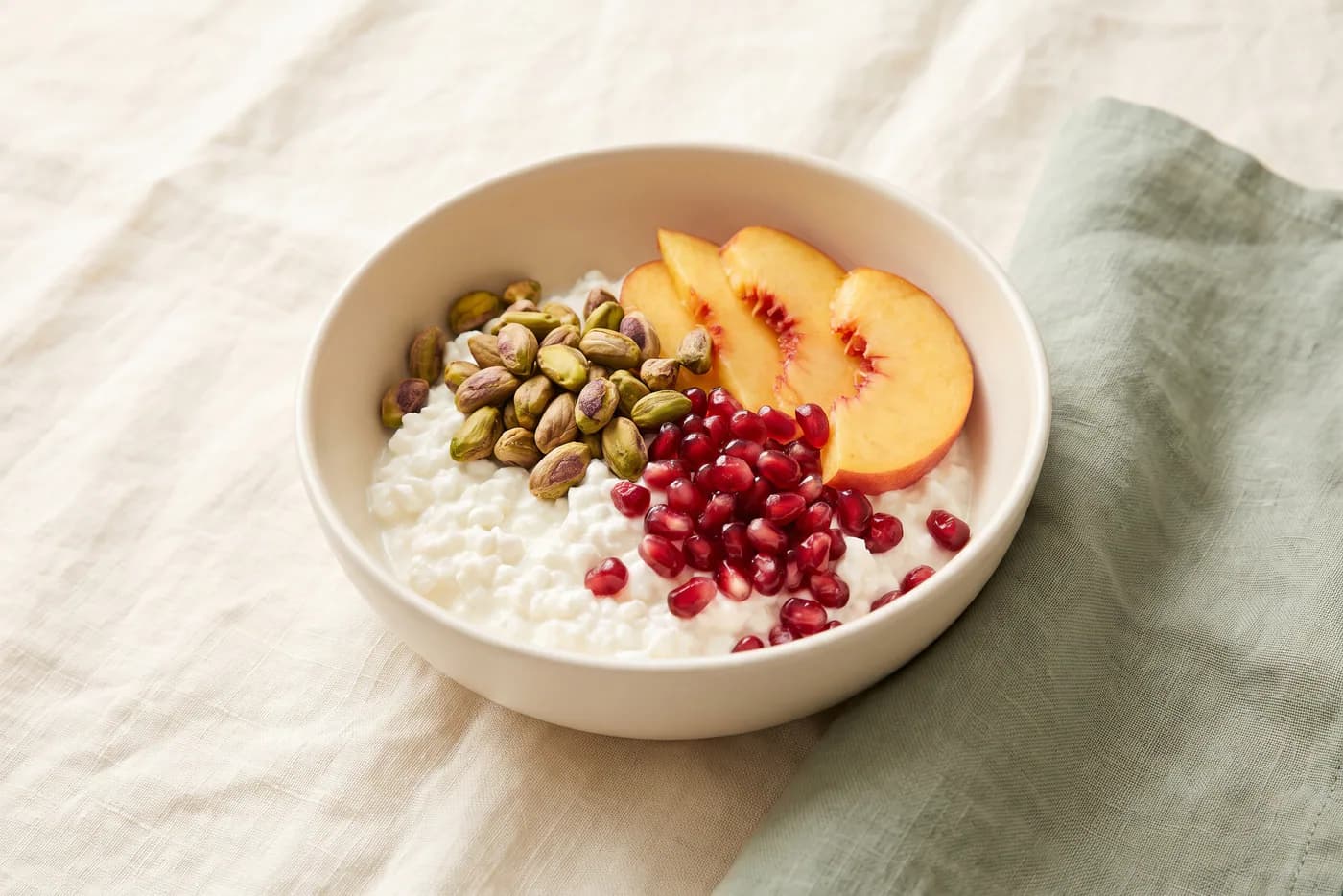 Peach Pistachio Cottage Cheese Breakfast Bowl